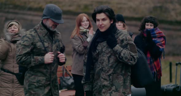 Happy Refugees Applauding Army Soldiers During War