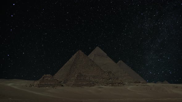Pyramid Complex in Egypt Under Night Sky