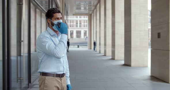 Businesswoman in Safety Mask Show Vaccine Passport to Security Guard at Office Building Entrance