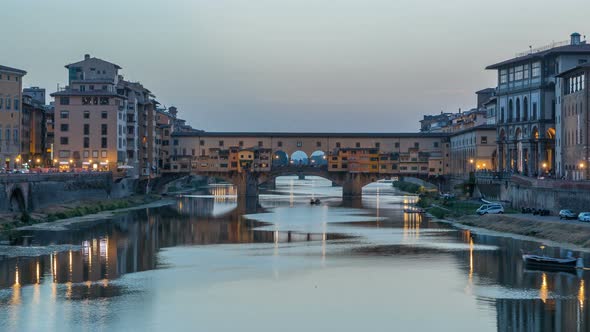 River Arno and Famous Bridge Ponte Vecchio Day To Night Timelapse After Sunset From Ponte Alle