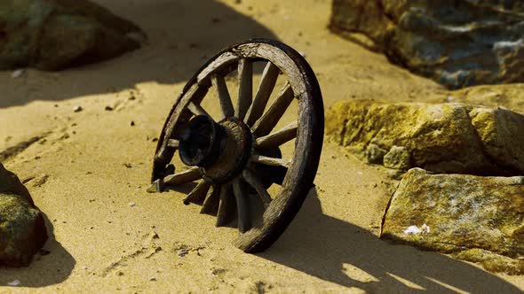 Old Wooden Cart Wheel at Sand Beach