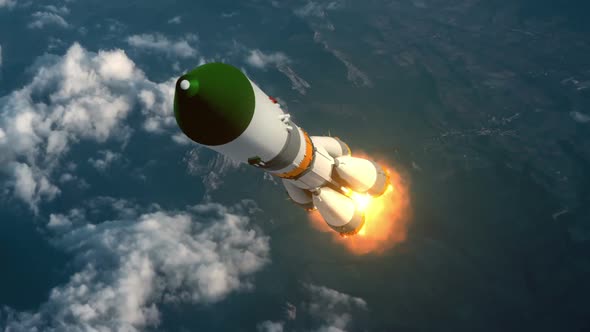 Cargo Carrier Rocket Takes Off Over The Clouds alt