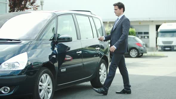 Man getting into car