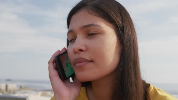 Young woman using her phone