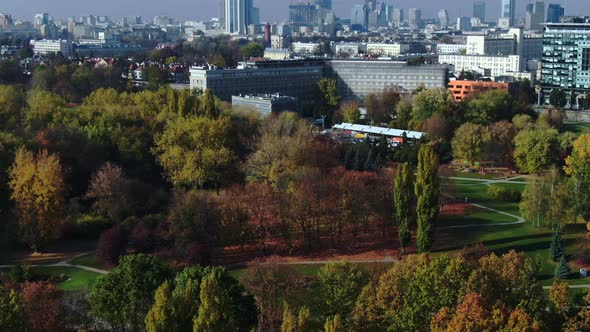 vivid urban park near Warsaw's city centre with Spire, Rondo, Palace of Science and Culture and Old