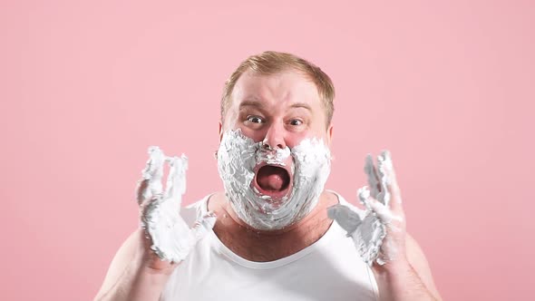 Image of Plump Shocked Amazed Man with Shaving Foam on Face