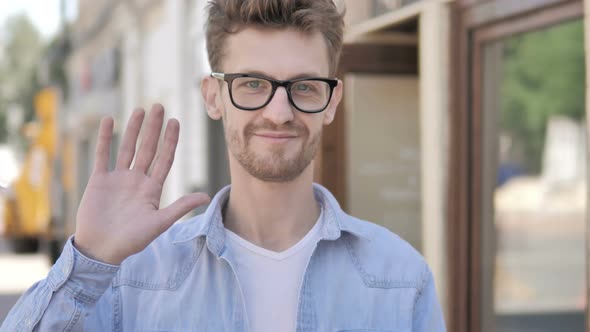 Hello, Welcoming Casual Young Man Standing Outdoor