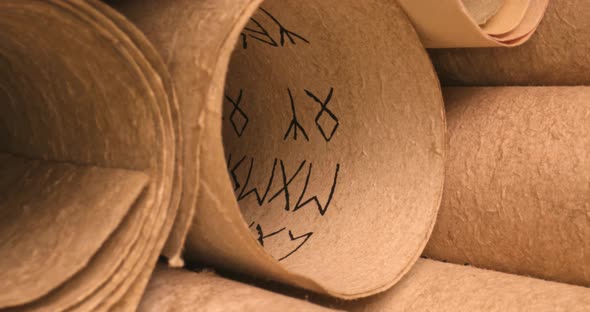 Scrolls stacked on a pile. Medieval manuscripts library.