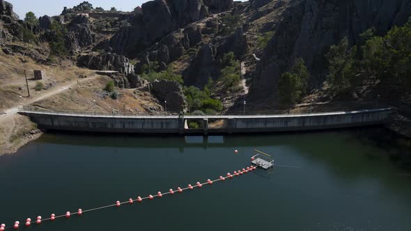 Penha Garcia dam and deep valley with natural pool. Aerial drone panoramic view