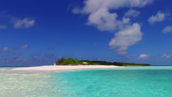 Sunny sky of exotic island beach trip by blue sea and sand background near palms