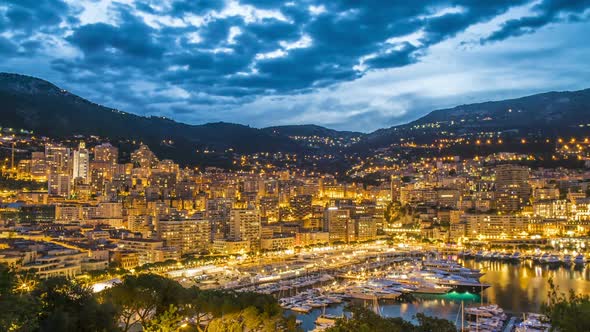 Monaco Illuminated by Night Lights, Luxury Resort With Elite Yacht Club, Aerial