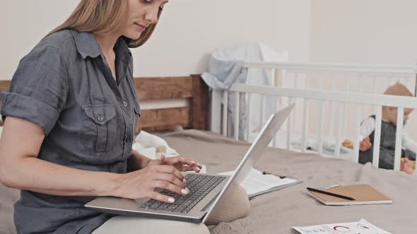 Mother of Toddler Working at Home