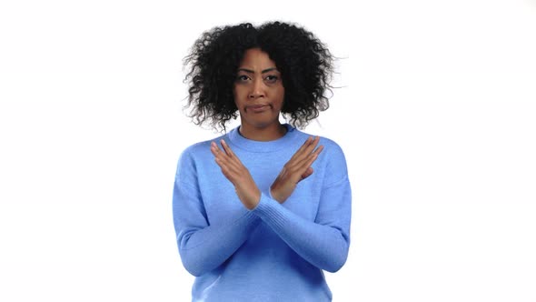 Mixed Race Woman Disapproving with No Crossing Hands Sign Make Basta Negation Enough Gesture