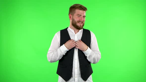Man with Smile Expressing He Is Innocent, Saying He Doesn't Know What's Going. Green Screen