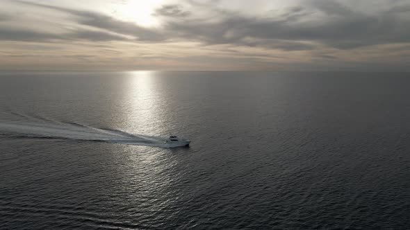 Sunrise the Yacht Float on the Pacific Ocean