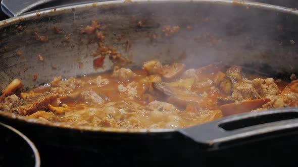 Beef and Mushrooms Chanterelles Cooking on Street Food Market Spain Barcelona