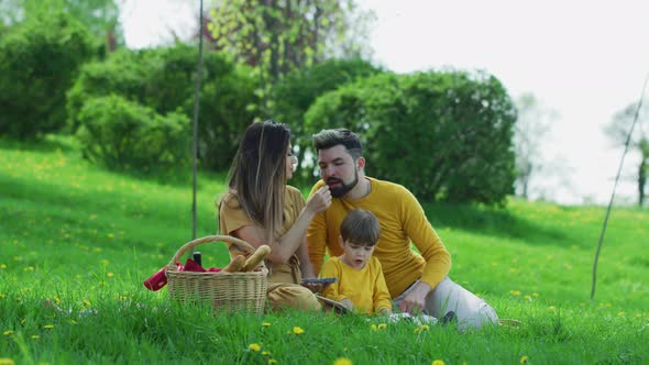 Family having a picnic in a park