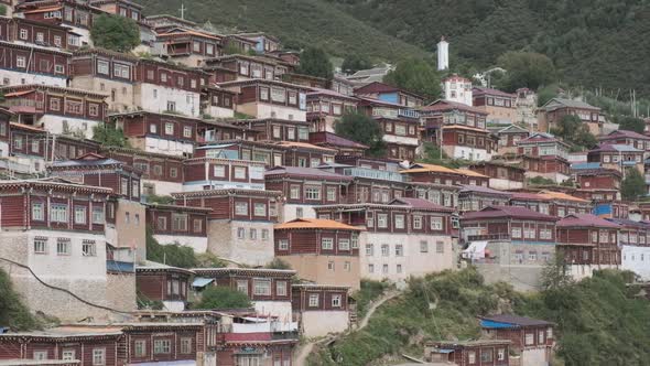 Wooden houses on foot of mountain