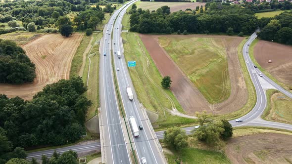 Aerial View of Highway with Moving Cars