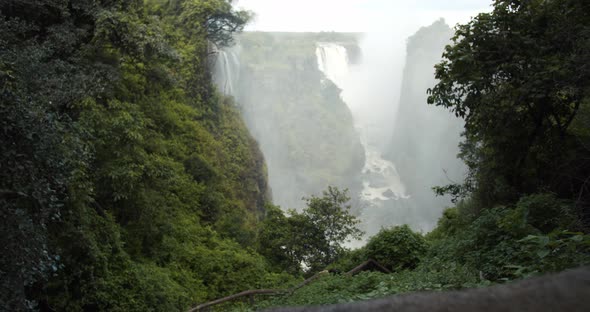 Victoria Falls, the largest waterfall in the world, view from the jungles nearby, 4k