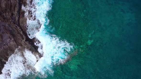 Top View of a Deserted Coast. Rocky Shore of the Island of Tenerife. Aerial Drone Footage of Ocean