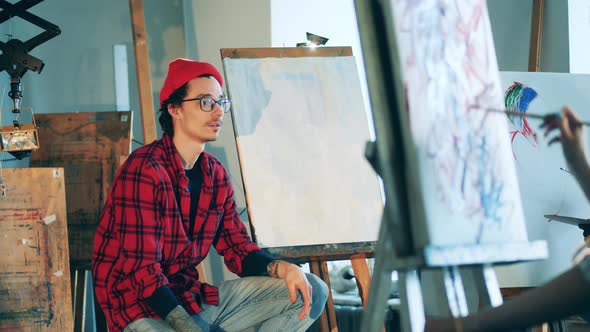 Male Teacher is Talking to Art Students During Class