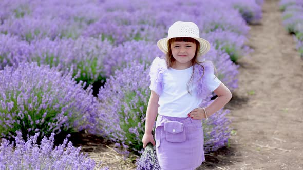 a Girl Walking in a Lavender Field