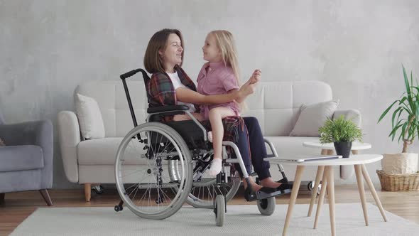 Disabled woman with her daughter