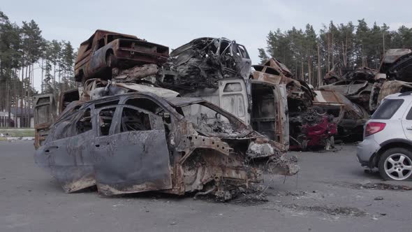 War in Ukraine a Dump of Shot and Burned Cars in Irpin Bucha District