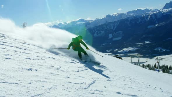 Person snowboarding on snowy mountain