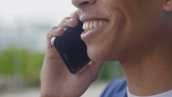 Closeup Shot of African American Businessman Talking on Phone