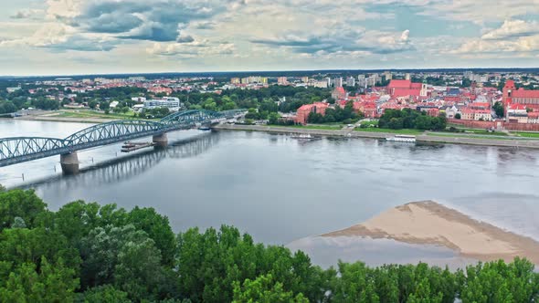 Summer view of Torun old town and Vistula river.