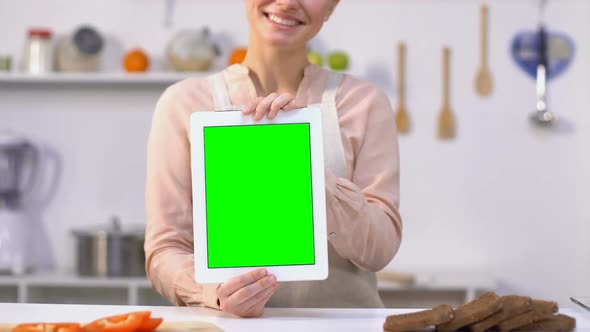 Smiling Housewife Holding Tablet With Green Screen, Products Delivery App