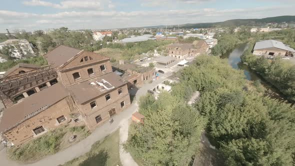 FPV drone view of old ruined factory for events 04