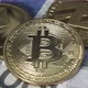 Physical Bitcoin, Litecoin and Ethereum Gold Coins Lying on a Polish Zloty or PLN Banknotes - VideoHive Item for Sale