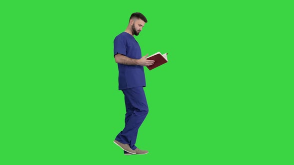 Doctor Reading Medical Journal While Walking on a Green Screen Chroma Key