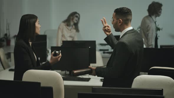 Businesspeople Freaking Out about Zombies in Office