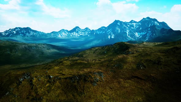 Mountains with Snow Capped Peaks in Summer