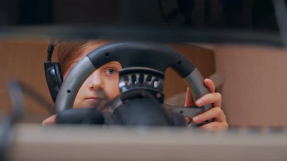 Girl Playing A Computer Racing