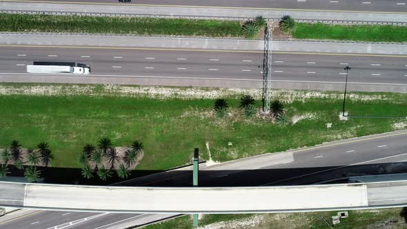 A top-down aerial view of traffic as ites on the interchanges and highways in Central Florida.