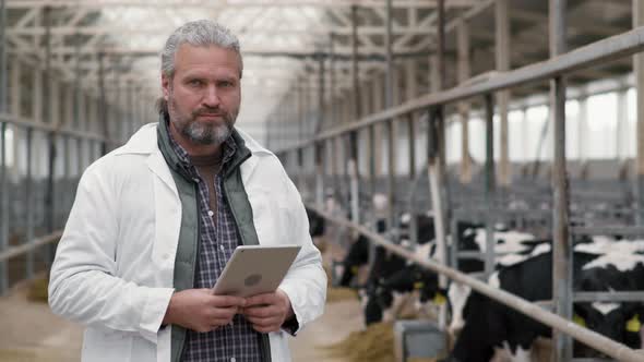 Portrait of Male Supervisor at Cattle Farm