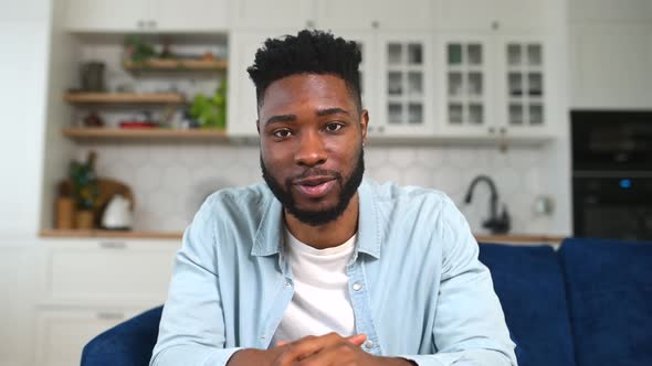 Portrait of Smiling and Friendly Multi Ethnic Male Freelancer Looking at the Camera