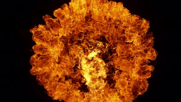 Super Slow Motion Shot of Round Fire Explosion Against the Black Wall at 1000Fps