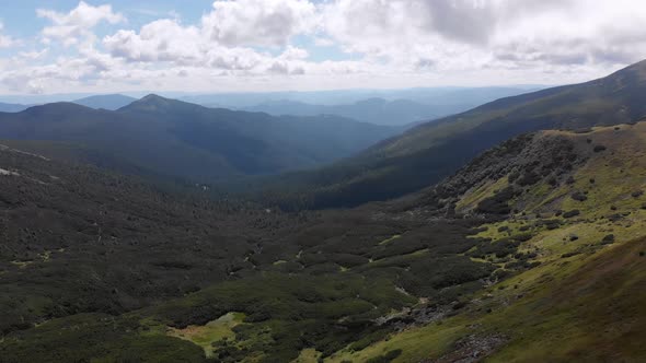 Aerial Panoramic View of Green Mountain Range and Hills in Valley of Carpathian