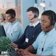 Black Customer Support Agent Working in Busy Call Center By Talking To the International Client - VideoHive Item for Sale