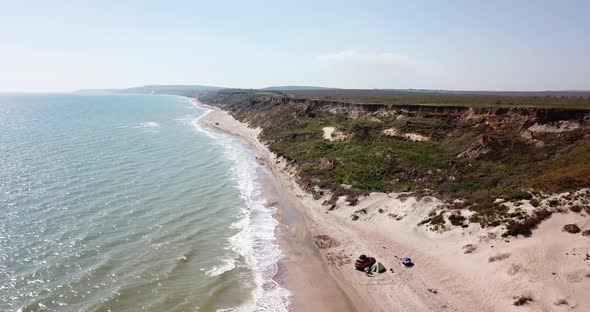 Aerial View of Solo Camping on Tropical Sandy Beach