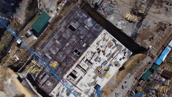 Crane And Worker On Construction Site alt