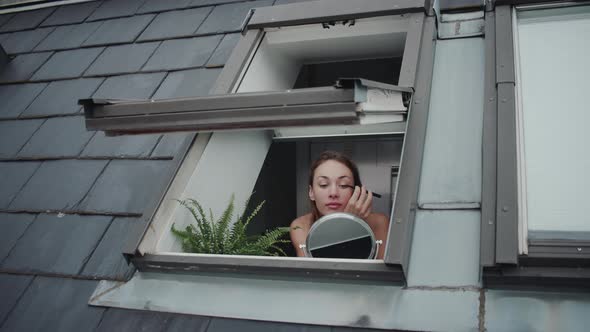 Beautiful Woman Applying Make Up