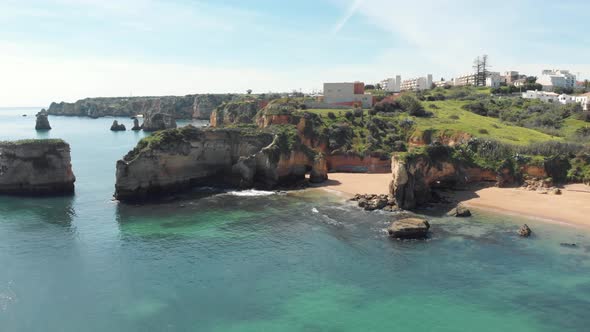 Praia dos Estudantes, intimate sand beach with a rock tunnel, Lagos, Algarve