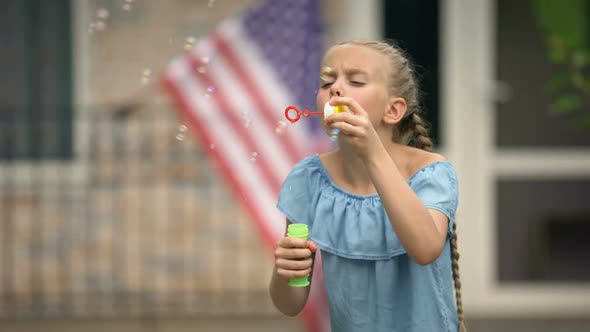 Positive Girl Blowing Soap Bubbles, Careless and Happy Childhood, Leisure Time